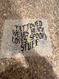 Tattooed and wears black